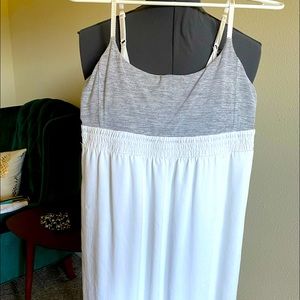 UEC Lululemon dress. Lined bust for support. Dress is lined as well. Pockets.